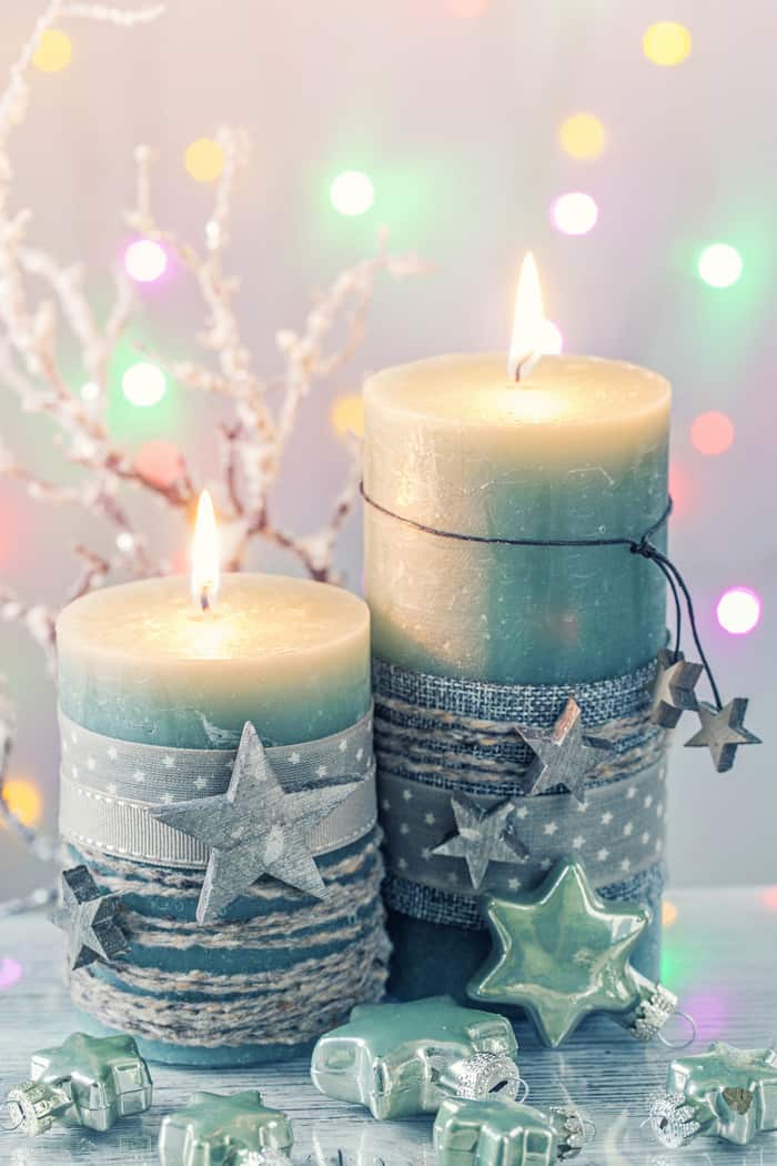 Green Candle Meaning - Two Candles Wrapped Stars