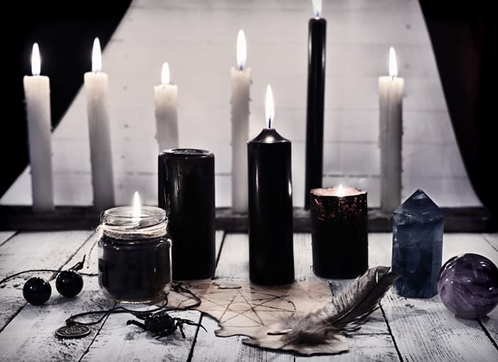 Black Candle Meaning - black and white candles on altar