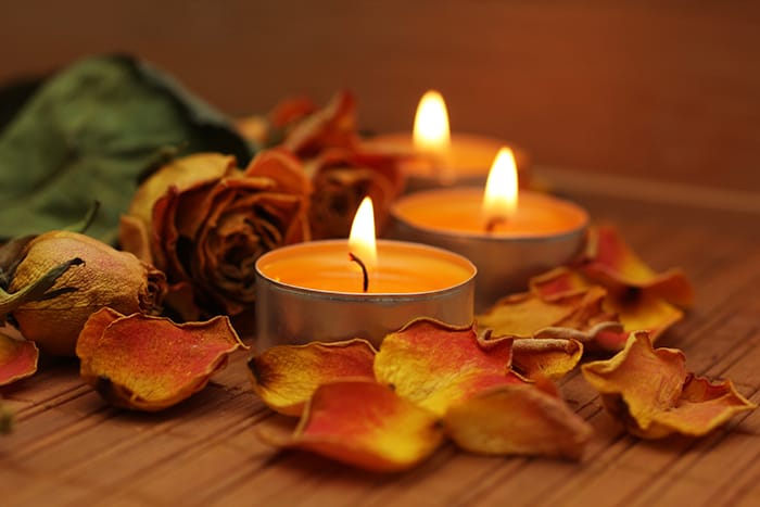 Orange Candle Meaning - Fall Leaves on Table