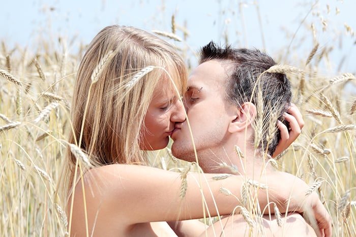 What Is Beltane - Couple Kissing in Wheat Field
